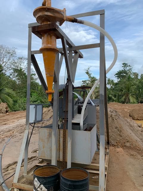 Another view of the Cyclone tailings reprocessing system on its steel stand